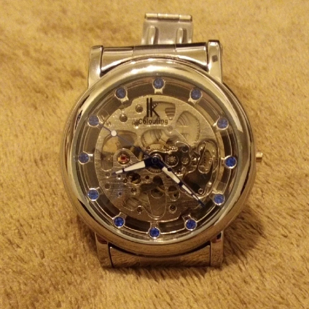 Elegant Silver Watch with Blue Details